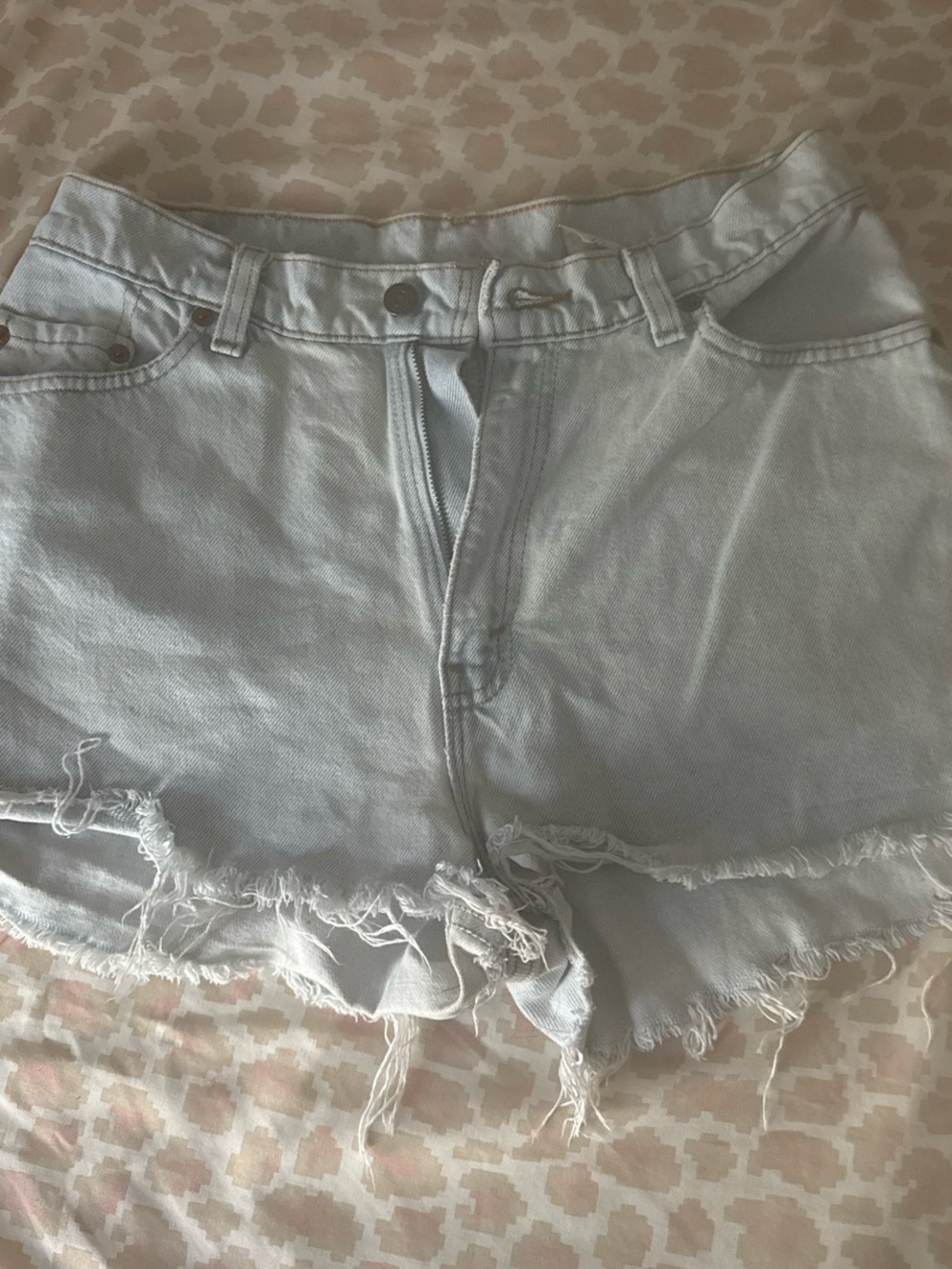 Levi's Pale Blue Distressed Denim Cutoff Shorts